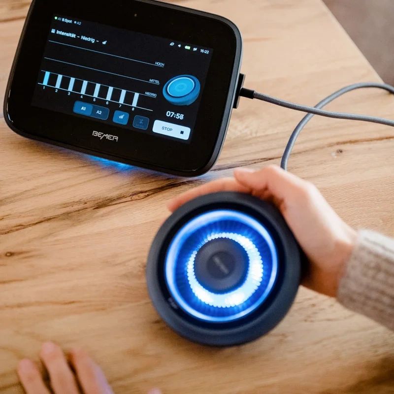 BEMER controller and applicator in use